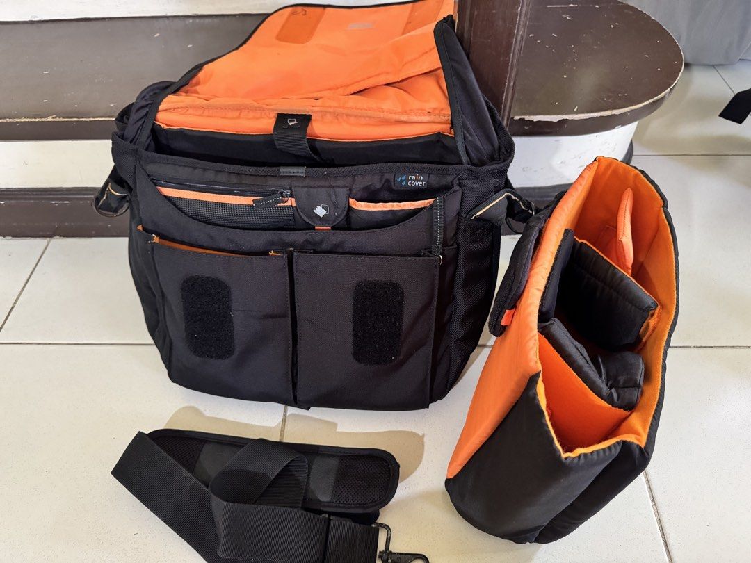 Vanguard UP-RISE 33 Camera Bag Insert with Shoulder Strap (Category: Camera Bags & Carriers) located in Caloocan City. Submitted by jomarrb (Listing ID 1461339011, Image 2). Description: - Black camera bag insert with vibrant orange interior - Includes a comfortable padded shoulder strap - Multiple compartments for organized storage of camera equipment - Provides excellent protection for your valuable gear - Designed to fit inside a larger tote o