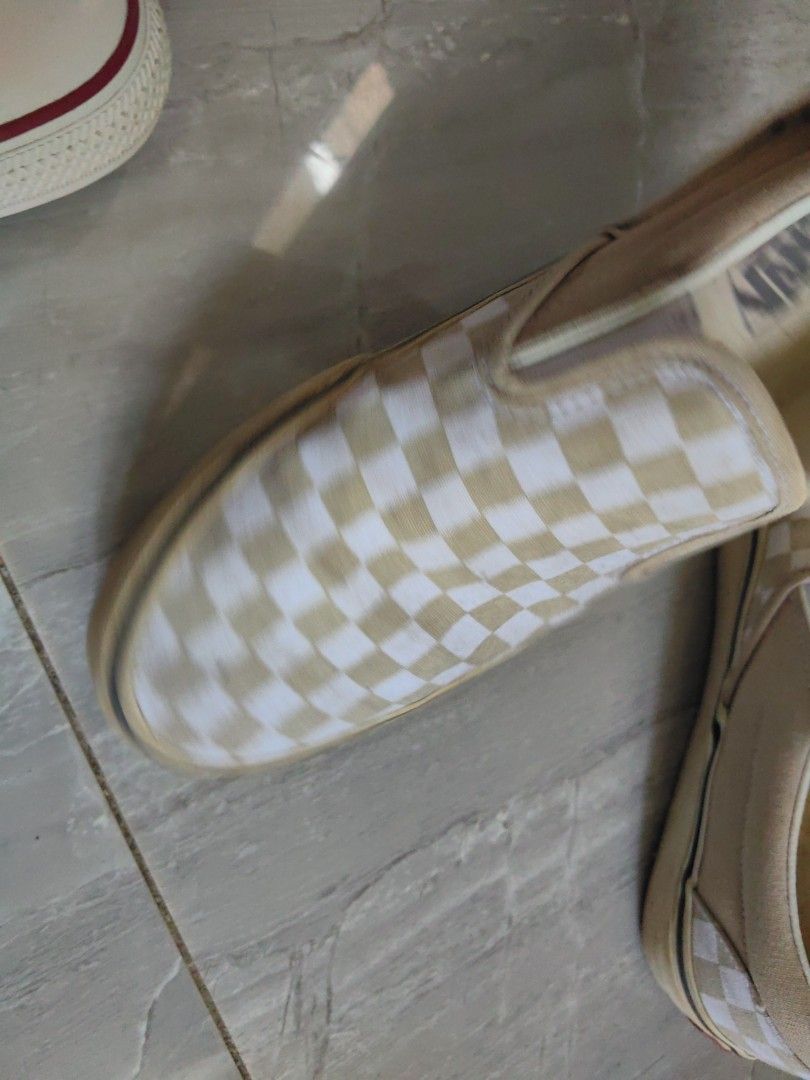 Vans Slip-On Checkerboard Tan White Shoes (Category: Sneakers) located in Quezon City. Submitted by flat.earther23 (Listing ID 1461342337, Image 2). Description: - Original Classic Vans slip-on shoes - Tan and white checkerboard pattern - Easy slip-on design - Vans logo on insole and heel tab - Soles show some wear, adding character - Ideal for everyday casual wear.