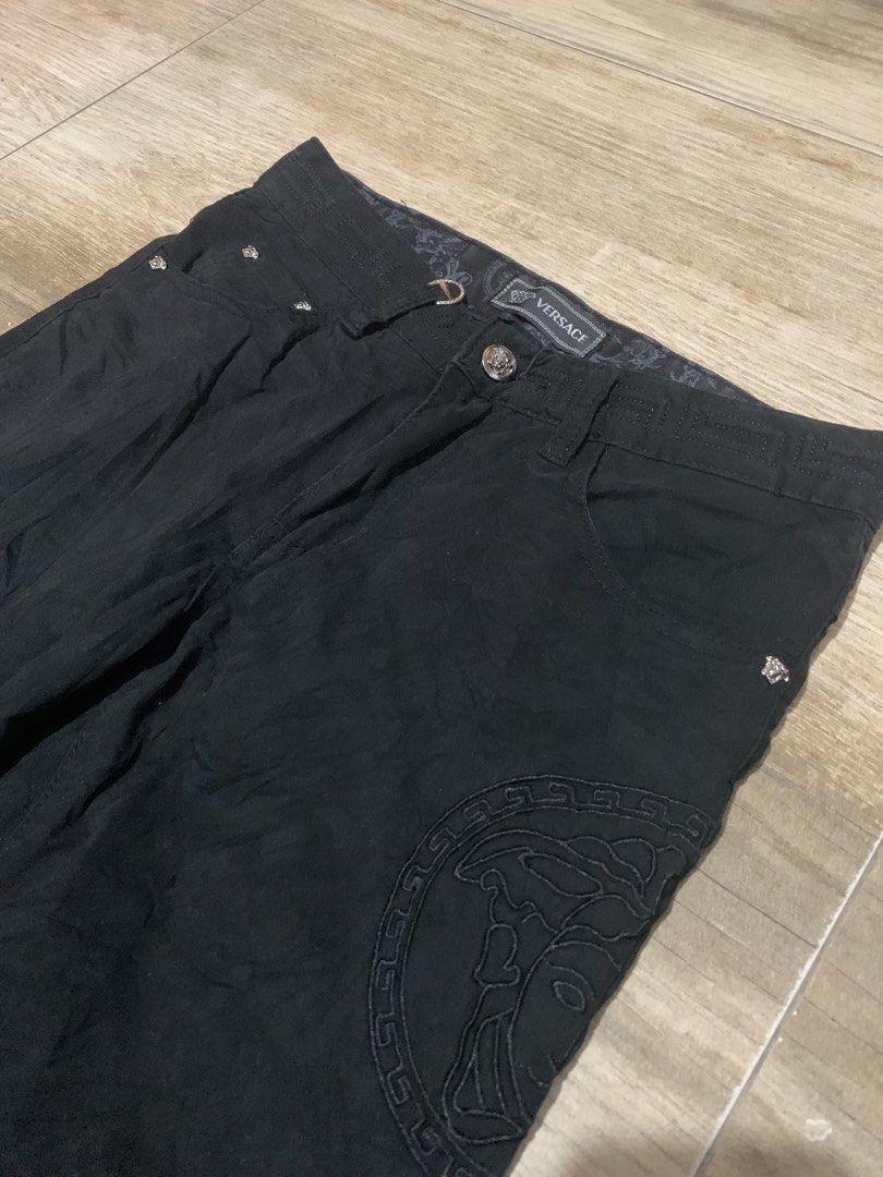 Versace Black Medusa Jeans (Category: Luxury Apparel) located in Tarlac. Submitted by luxurious_apparel (Listing ID 1461347940, Image 2). Description: - Authentic Versace Jeans - Iconic Medusa head embroidered on the side - Classic button and zip closure - Four-pocket styling for practicality - Made with premium fabric for superior comfort - Ideal for elevating your casual style.