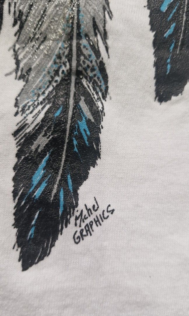 Vintage american native michel grapics tee (Category: Tshirts & Polo Shirts ) located in Pili. Submitted by the_g_thrift (Listing ID 1461380959, Image 3). Description: size large dimes: 21 x 25.5 single stitch all the way need wash.