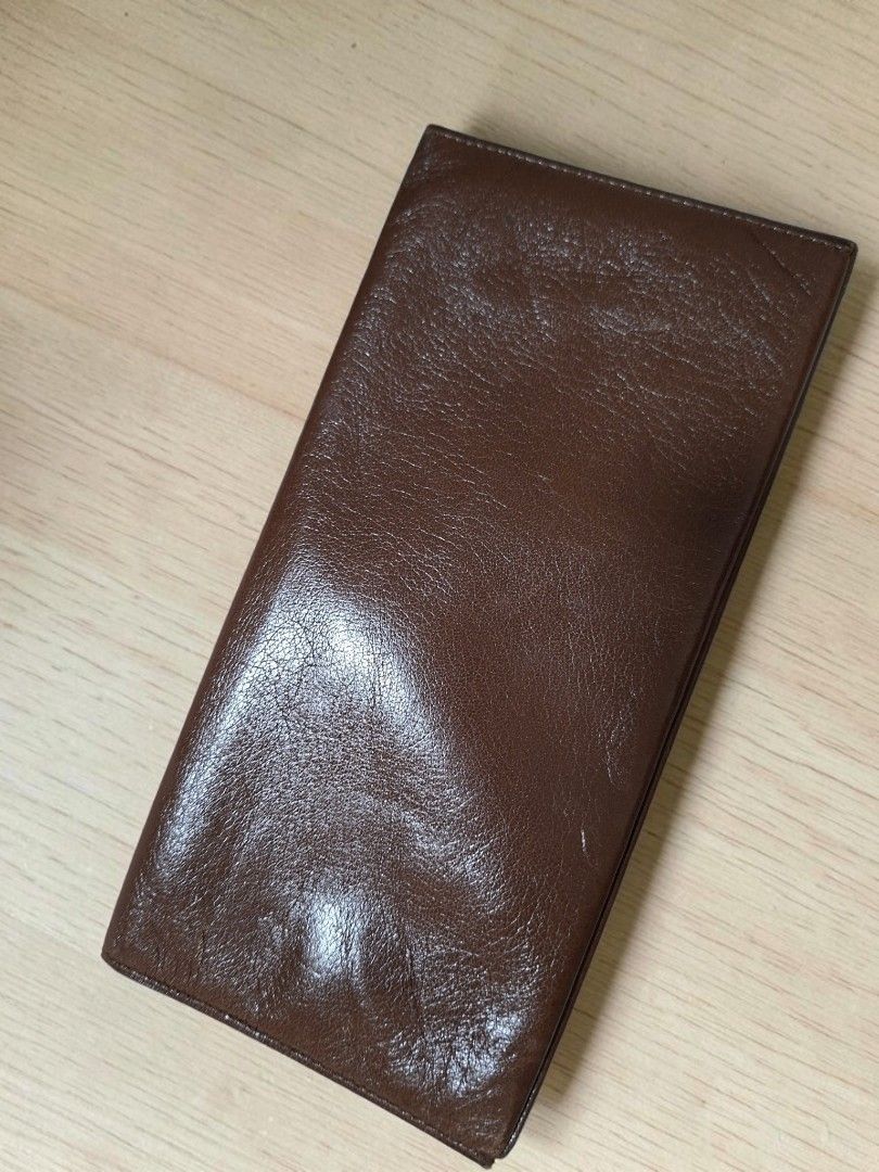 VINTAGE AUTHENTIC LOEWE LEATHER CHECKBOOK HOLDER WALLET (Category: Wallets & Card holders) located in Las Pinas. Submitted by annachiaonair2037 (Listing ID 1461373000, Image 2). Description: VINTAGE AUTHENTIC LOEWE LEATHER CHECKBOOK HOLDER WALLET FROM JAPAN GENUINE SOFT LEATHER NORMAL SIGN OF USAGE OF VINTAGE PIECE ON LEATHER BUT NO CRACKS, TEAR. Disclaimer: I am not affiliated with, associated with, or authorized by any of the brands featured po