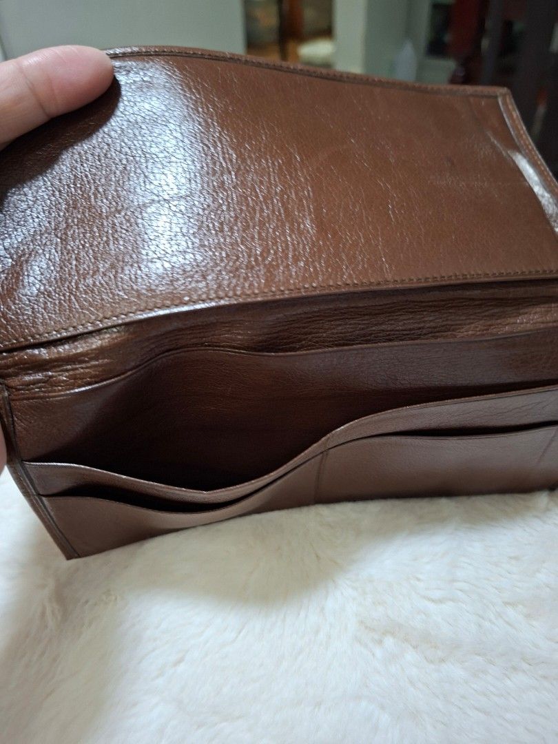 VINTAGE AUTHENTIC LOEWE LEATHER CHECKBOOK HOLDER WALLET (Category: Wallets & Card holders) located in Las Pinas. Submitted by annachiaonair2037 (Listing ID 1461373000, Image 3). Description: VINTAGE AUTHENTIC LOEWE LEATHER CHECKBOOK HOLDER WALLET FROM JAPAN GENUINE SOFT LEATHER NORMAL SIGN OF USAGE OF VINTAGE PIECE ON LEATHER BUT NO CRACKS, TEAR. Disclaimer: I am not affiliated with, associated with, or authorized by any of the brands featured po