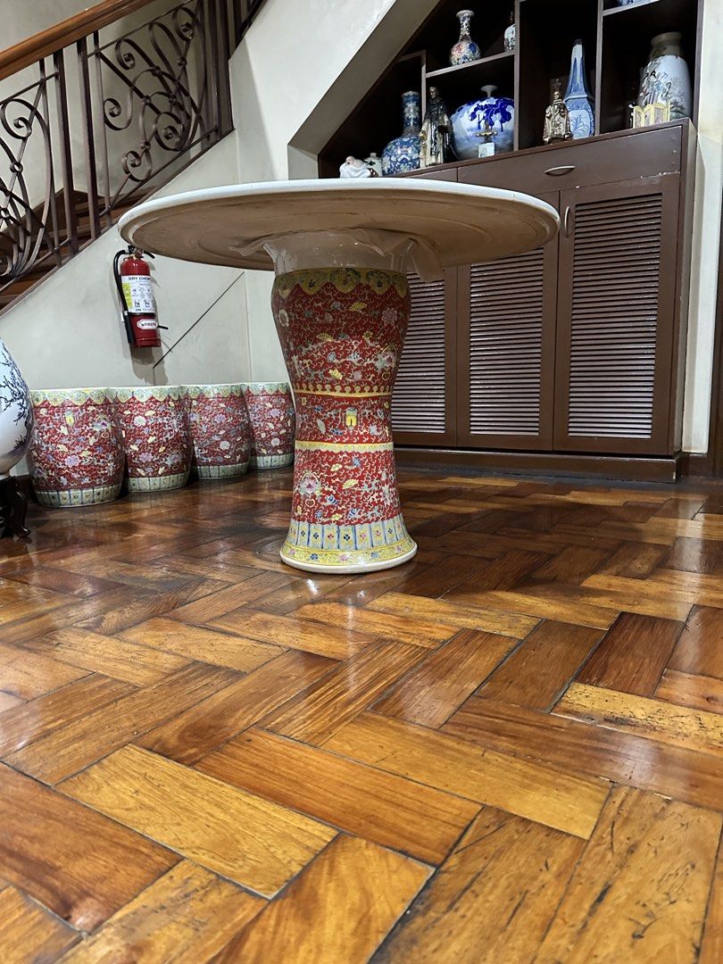 Vintage Chinese Porcelain Table with 4 Stools (Category: Tables & Sets) located in Quezon City. Submitted by katzlee (Listing ID 1461533998, Image 1). Description: - Beautiful vintage Chinese ceramic table and 4 matching stools. - Intricate floral and figural designs in red, gold, and blue. - Table features a round top with a scenic painting. - Stools are barrel-shaped. - Perfect statement pieces for your home. - Selling as a complete set. -Outdo