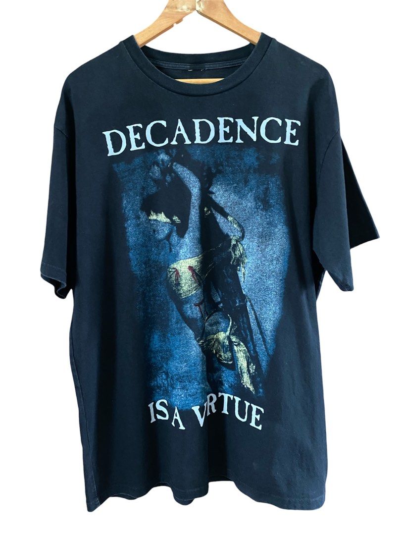 Vintage Decadence Shirt (Category: Tshirts & Polo Shirts ) located in Dumaguete. Submitted by infiniteloot_ (Listing ID 1461330525, Image 1). Description: Vintage Decadence Shirt 30 length x 24 width good condition no flaws DM 🪖.