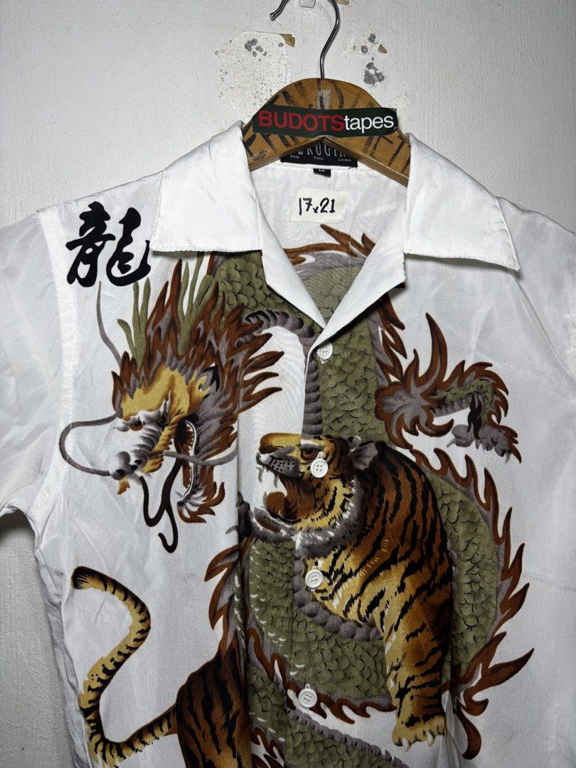 Vintage Dragon AOP Polo (Category: Tshirts & Polo Shirts ) located in Calamba. Submitted by sinauna. (Listing ID 1461518455, Image 3). Description: WTS: Vintage Ferugini Dragon AOP Polo Condition/Issues: needs wash (Note: Item’s not faded. Color may vary due to lighting) Dimension: 17x21 Size on tag: Medium Price: Mine - 449+SF Plus shipping fee! Free shipping if you purchase more than 3 items. Also, can give you a discount in my previous listing