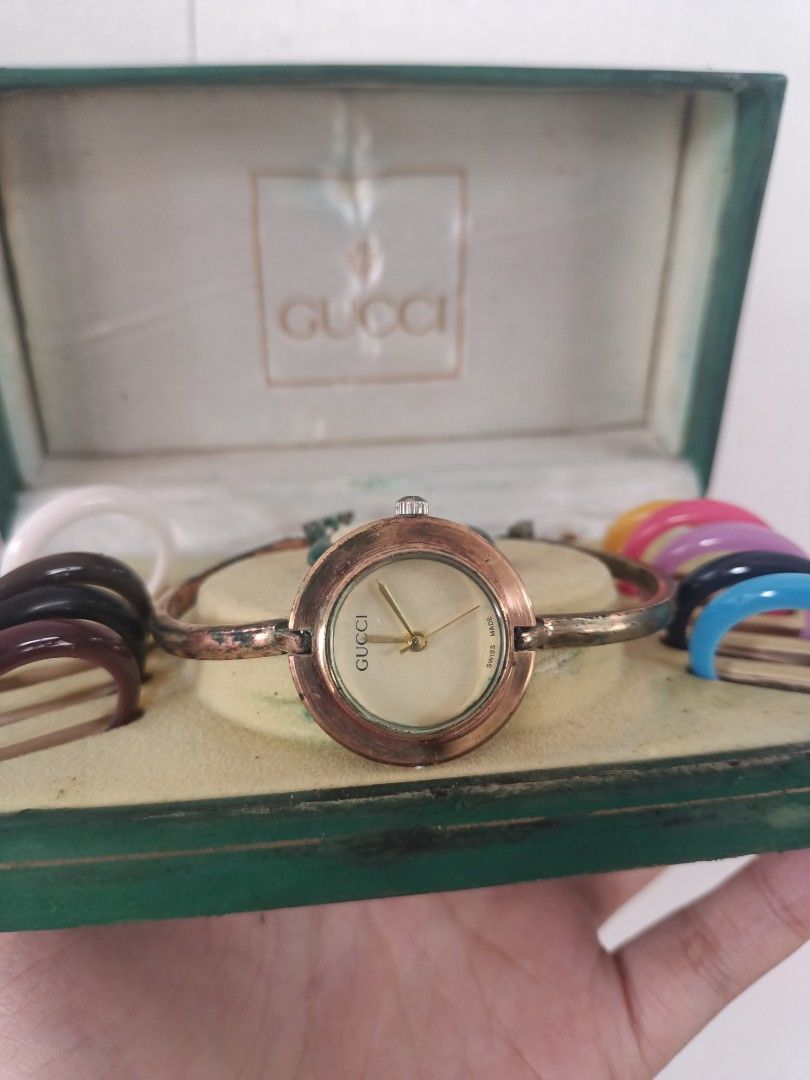 Vintage Gucci Bangle Watch (Category: Luxury Watches) located in Bislig. Submitted by vanityarchives (Listing ID 1461389036, Image 2). Description: ₱6,999 or your best offer -authentic from USA (got it from a relative, my tita) -unused, stored nalang kaya meron verdigris around the watch (tried to remove some of the verdigris but meron pa din natira mahirap linisin if you don't have the right tools😅) -box is in fair condition, i have cleaned it 