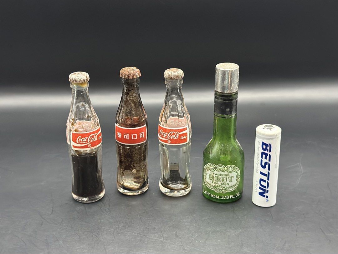 Vintage Mini Coca-Cola Bottles (Set) (Category: Vintage Collectibles) located in Batangas. Submitted by batang_90s_ako (Listing ID 1461447558, Image 2). Description: 90s vintage Mini Coca-Cola bottles - Sold as set - See actual photos As - is condition.