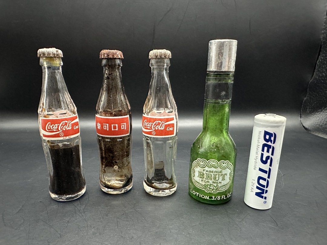 Vintage Mini Coca-Cola Bottles (Set) (Category: Vintage Collectibles) located in Batangas. Submitted by batang_90s_ako (Listing ID 1461447558, Image 1). Description: 90s vintage Mini Coca-Cola bottles - Sold as set - See actual photos As - is condition.
