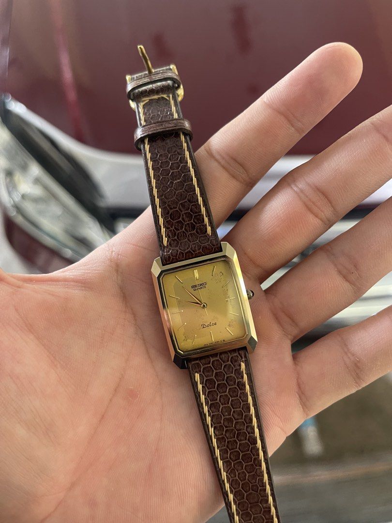 Vintage Seiko 5 (Category: Women's Watches) located in Iriga City. Submitted by bogart857 (Listing ID 1461334921, Image 1). Description: - Model: Seiko dolce - Movement: Japanese Quartz 7731-5150 -Material: Tungsted carbide (superior scratch resistant) - Case: Gold-tone - Dial: Golden dial W/ patina marks (snowflake) - Strap: Burgundy crocodial strap W/ stitching - Era: 1980's - Case size: 27.7 mm (with crown) 📍Camarines sir, Iriga city 🚢 can s