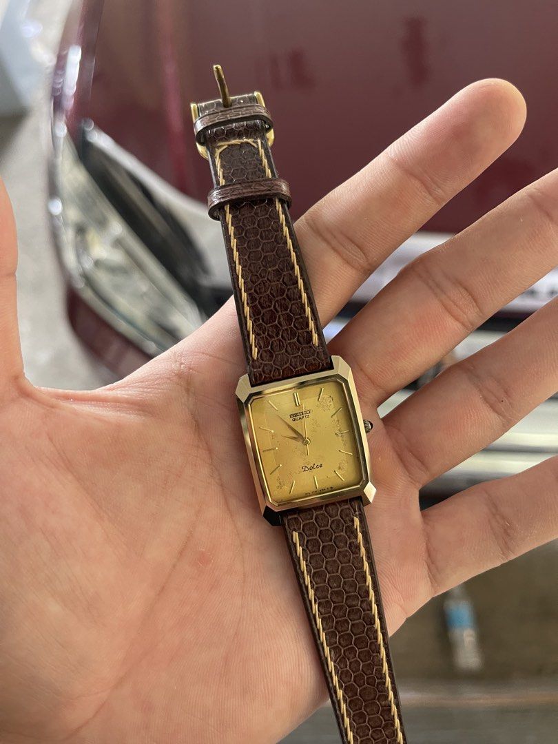 Vintage Seiko 5 (Category: Women's Watches) located in Iriga City. Submitted by bogart857 (Listing ID 1461334921, Image 2). Description: - Model: Seiko dolce - Movement: Japanese Quartz 7731-5150 -Material: Tungsted carbide (superior scratch resistant) - Case: Gold-tone - Dial: Golden dial W/ patina marks (snowflake) - Strap: Burgundy crocodial strap W/ stitching - Era: 1980's - Case size: 27.7 mm (with crown) 📍Camarines sir, Iriga city 🚢 can s