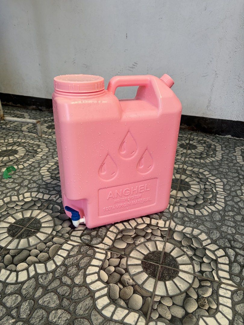 Water Jug | Basyo | Water Container (Category: Water Bottles & Tumblers) located in San Fernando. Submitted by shabelifer (Listing ID 1461458608, Image 1). Description: - Pink water container with a convenient tap. - Features a sturdy handle for easy carrying. - Constructed from 100% virgin material for durability. - Ideal for outdoor events, picnics, or as a backup water supply. - Ready for its new home!.