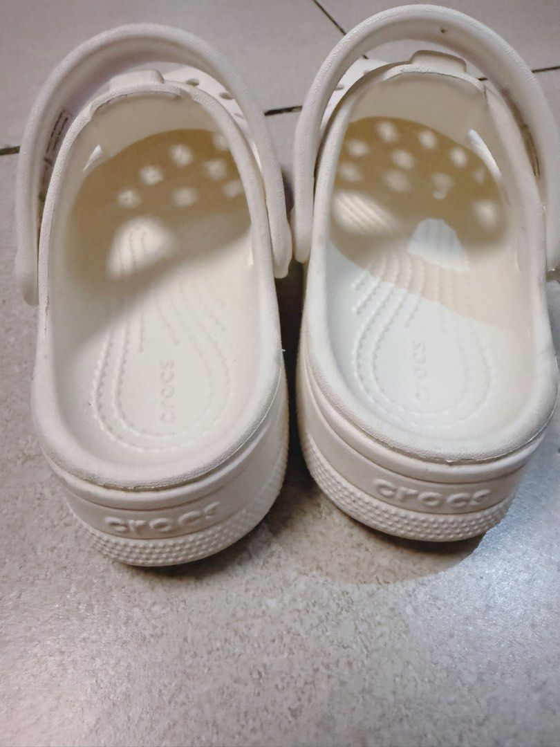 White Crocs Mary Jane Sandals (Category: Flats & Sandals) located in Dasmarinas. Submitted by anneraygon (Listing ID 1461330535, Image 3). Description: - Size: C11 (For Kids) -White Crocs Mary Jane sandals. -Easy slip-on style with a secure strap. -RFS: Decluttering. Rarely used. Nakaliitan nalang..
