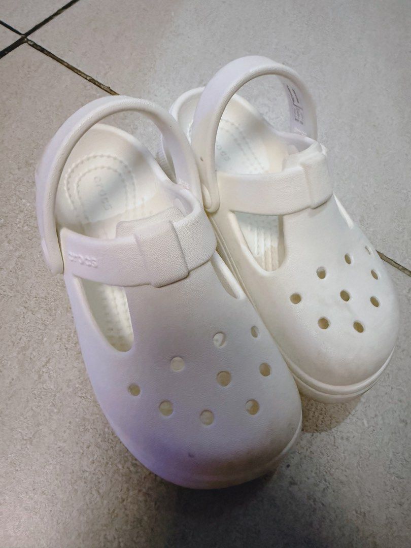 White Crocs Mary Jane Sandals (Category: Flats & Sandals) located in Dasmarinas. Submitted by anneraygon (Listing ID 1461330535, Image 1). Description: - Size: C11 (For Kids) -White Crocs Mary Jane sandals. -Easy slip-on style with a secure strap. -RFS: Decluttering. Rarely used. Nakaliitan nalang..