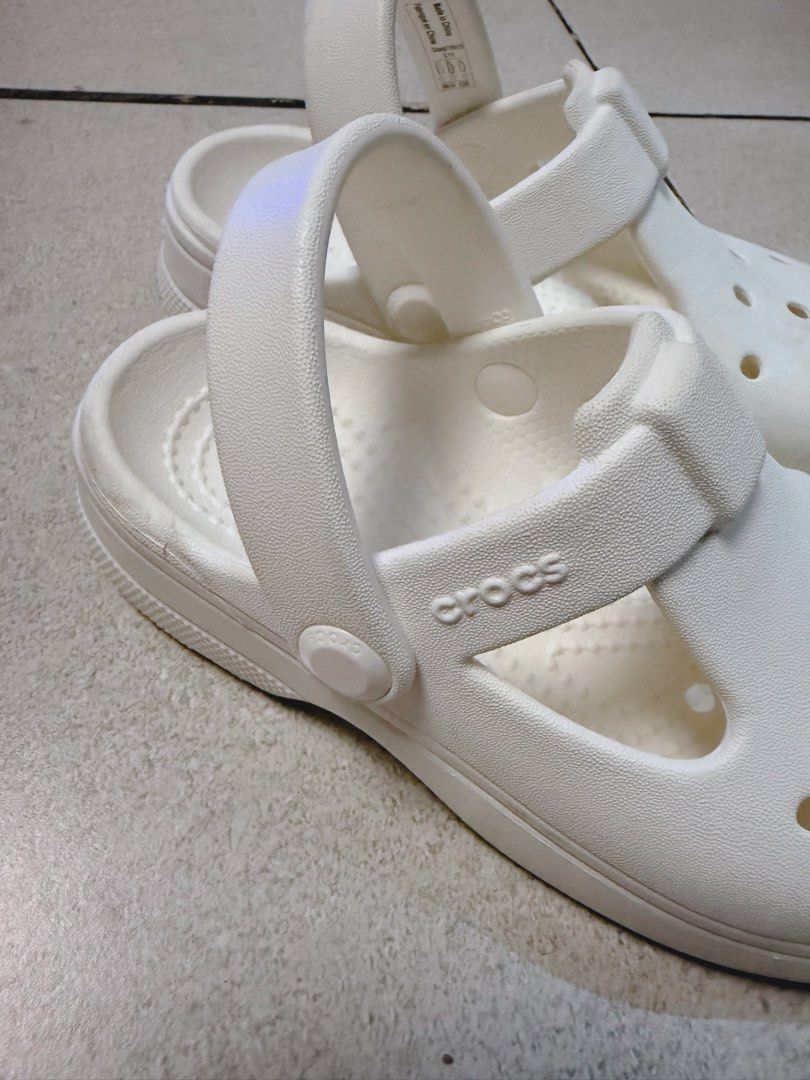 White Crocs Mary Jane Sandals (Category: Flats & Sandals) located in Dasmarinas. Submitted by anneraygon (Listing ID 1461330535, Image 2). Description: - Size: C11 (For Kids) -White Crocs Mary Jane sandals. -Easy slip-on style with a secure strap. -RFS: Decluttering. Rarely used. Nakaliitan nalang..