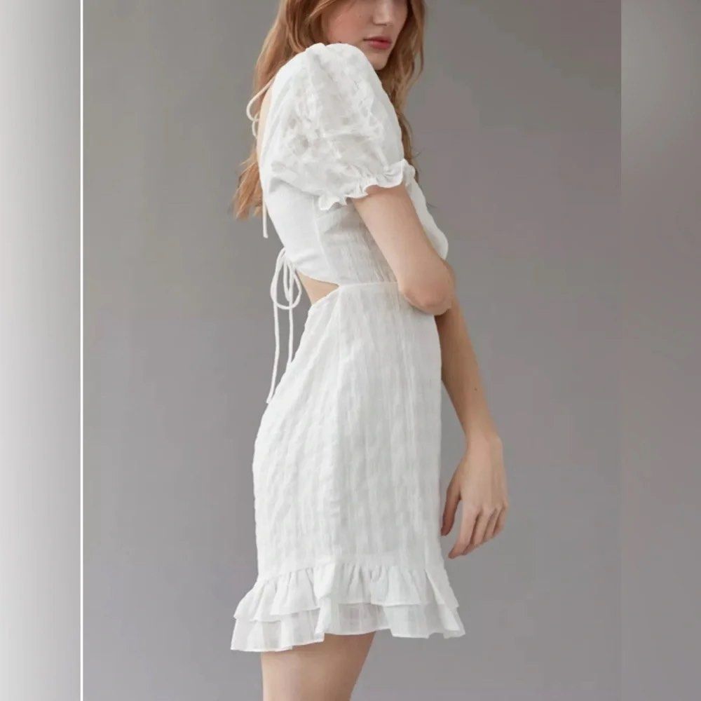 White Dainty Mini Dress like Maje (Category: Dresses) located in Manila. Submitted by declutterwithC (Listing ID 1461484279, Image 1). Description: Can fit small to medium Waist up to 30 Dainty pretty top Brand : Ruby Sees.
