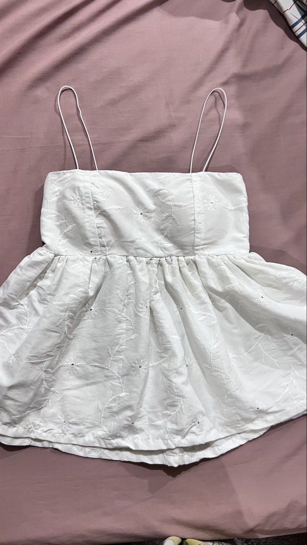 White Embroidered Camisole Top (Category: Sleeveless) located in Manila. Submitted by ponyows (Listing ID 1461405539, Image 1). Description: mop: gcash/bpi mod:lalamove /j&t location: sampaloc manila no return & refund.