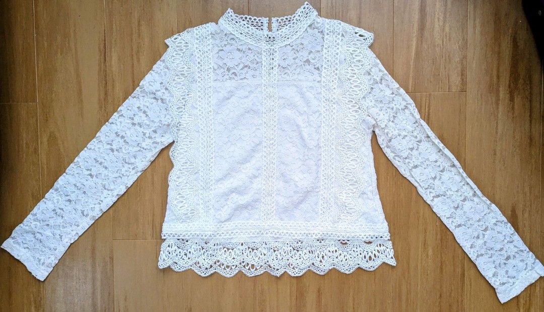 White Lace High Neck Long Sleeve Top (Category: Longsleeves) located in Quezon City. Submitted by belle2596 (Listing ID 1461409426, Image 1). Description: - Beautiful white lace top - High neckline - Long sleeves - Intricate lace detailing throughout - Pretty scalloped hem edge - Looks lovely layered.