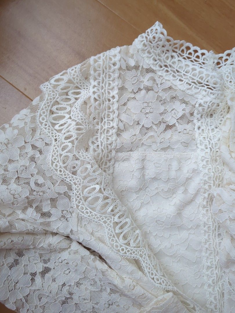 White Lace High Neck Long Sleeve Top (Category: Longsleeves) located in Quezon City. Submitted by belle2596 (Listing ID 1461409426, Image 2). Description: - Beautiful white lace top - High neckline - Long sleeves - Intricate lace detailing throughout - Pretty scalloped hem edge - Looks lovely layered.