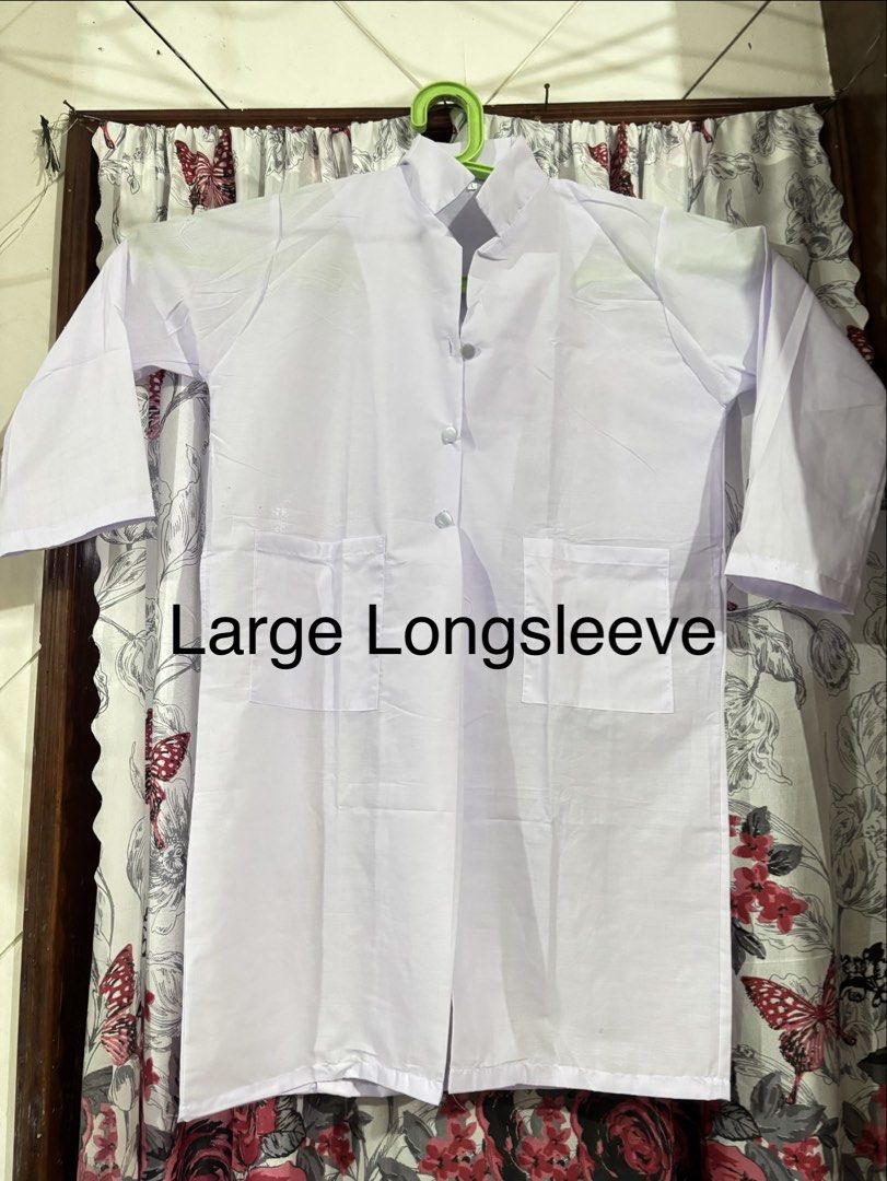 White Long Sleeve Lab Coat - Multiple Sizes Available (Category: Coats, Jackets and Outerwear) located in Manila. Submitted by rosel2001 (Listing ID 1461411270, Image 3). Description: - Classic white long sleeve lab coats - Available sizes: Xs,Small, Medium, Large, XL, XXL - Features a button-up front - Two convenient front pockets - Perfect for school, work, or science projects.