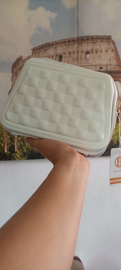 White Quilted Crossbody Bag with Zigzag Strap (Category: Cross-body Bags) located in Manila. Submitted by swshop.705 (Listing ID 1461442468, Image 2). Description: Take these 2 for 350 only. - Cute white crossbody bag - Stylish quilted pattern on the front - Detachable zigzag strap for versatile styling - Elegant gold zipper details - Ideal for everyday use or evening outings - Spacious enough for your phone, wallet, and keys - Lightweight and ea
