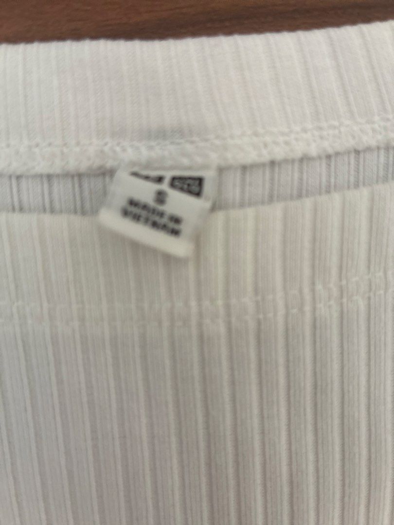 White Ribbed T-shirt Size S (Category: Shirts) located in Pasig City. Submitted by slr1949 (Listing ID 1461561424, Image 2). Description: - Classic white t-shirt - Ribbed texture for added detail - Short sleeves and crew neck - Made in Vietnam - Effortlessly pairs with any outfit - Ideal for daily wear.