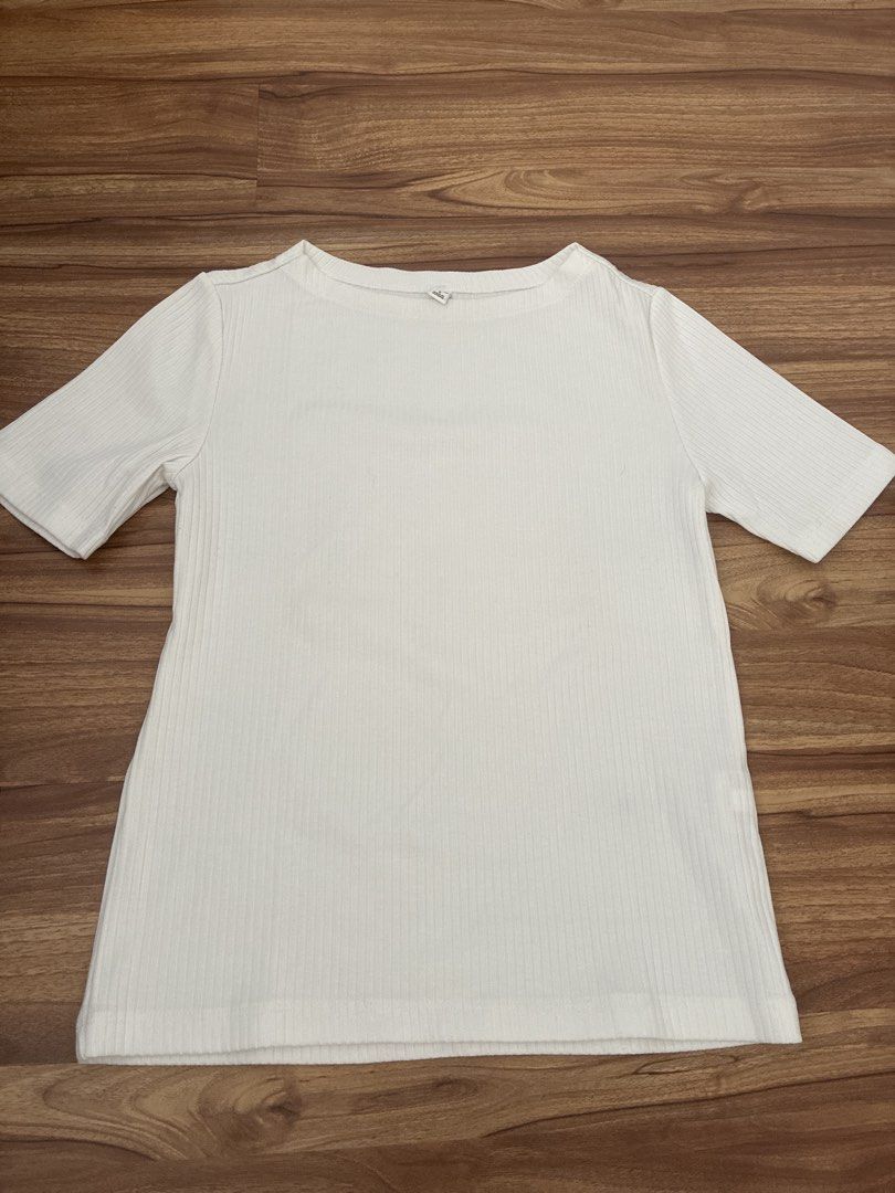 White Ribbed T-shirt Size S (Category: Shirts) located in Pasig City. Submitted by slr1949 (Listing ID 1461561424, Image 1). Description: - Classic white t-shirt - Ribbed texture for added detail - Short sleeves and crew neck - Made in Vietnam - Effortlessly pairs with any outfit - Ideal for daily wear.