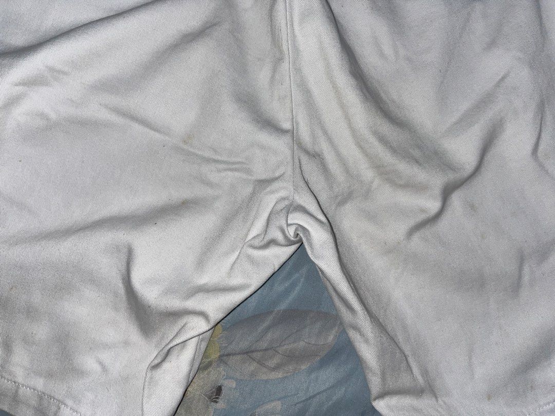 White shorts (Category: Shorts) located in Quezon City. Submitted by yan.declutter (Listing ID 1461385290, Image 3). Description: I had it tailored to fit my waist, pero pwedeng tanggalin. It fits up to medium size..