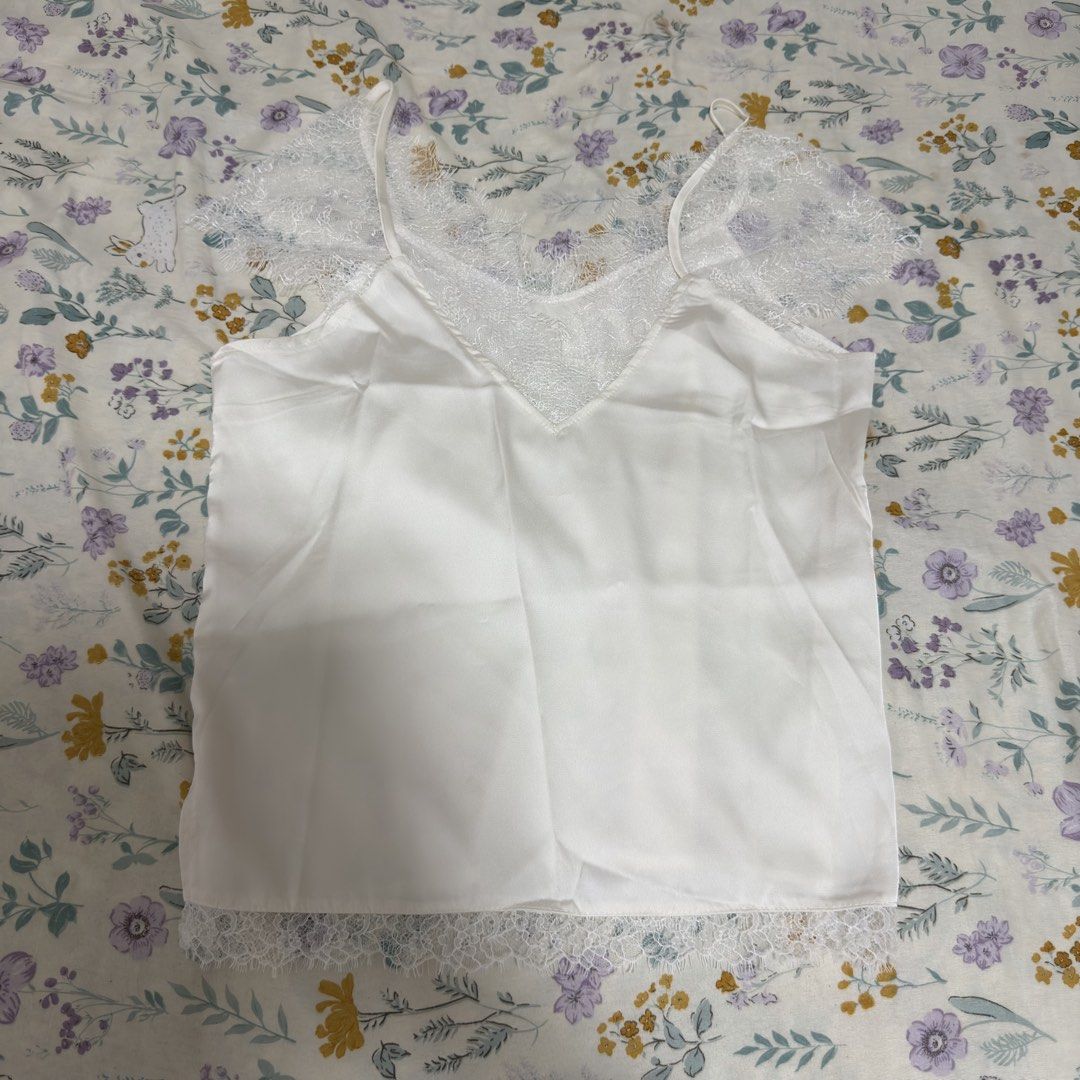 White Silk Top (Category: Others Tops) located in Manila. Submitted by declutters.wrdrb (Listing ID 1461473504, Image 1). Description: .