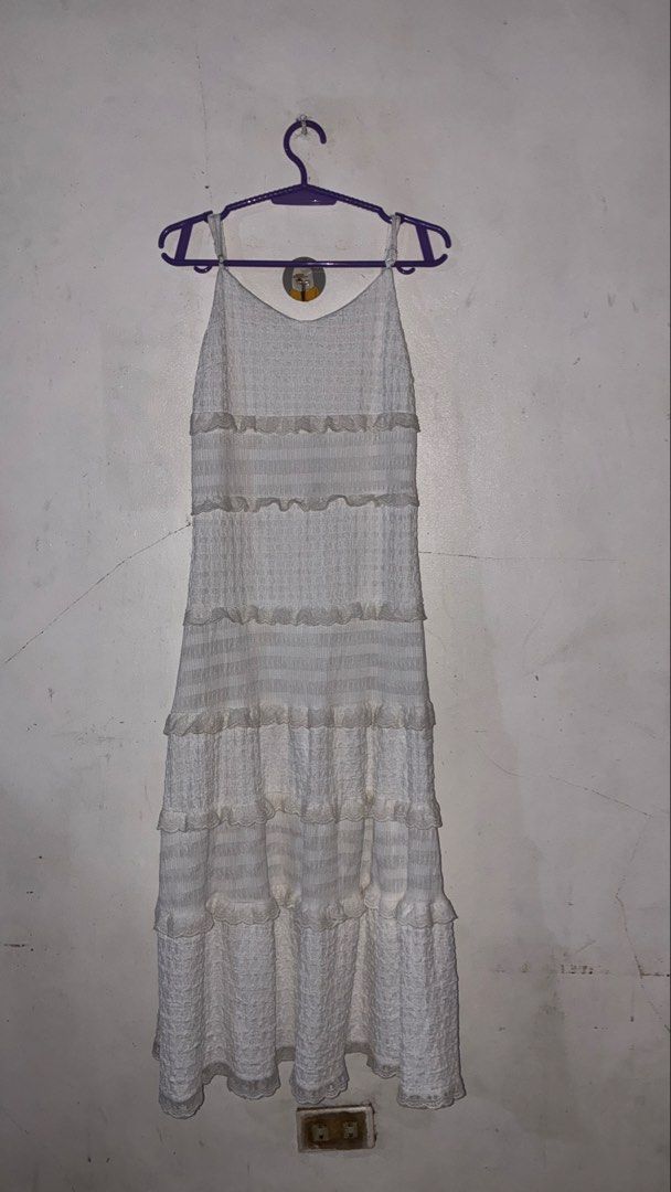 White Tiered Ruffle Maxi Dress with Spaghetti Straps (Category: Dresses) located in Placer. Submitted by talaalond61563 (Listing ID 1461331339, Image 1). Description: - ZIJUN White maxi dress - Spaghetti straps - Tiered design with ruffles - Smocked sections - Textured fabric pattern - Medium size - Ideal for beach vacations or casual summer wear - Comfortable and easy to wear.