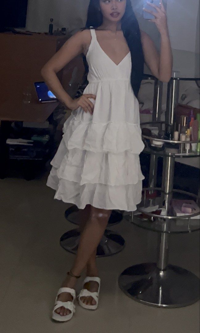 White Tiered Ruffle Mini Dress (Category: Dresses) located in Manila. Submitted by dianavictoriano (Listing ID 1461549923, Image 2). Description: White dress.
