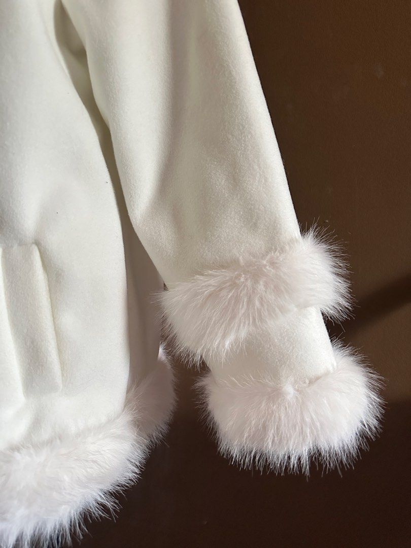 White Winter Coat with Fur (Category: Coats, Jackets and Outerwear) located in Paranaque City. Submitted by eckadcms (Listing ID 1461359077, Image 3). Description: — Never worn / unused — With original tag — Soft fur/faux-fur trim on the hood, sleeves, and bottom hem — With lining inside for extra warmth and comfort — gold-tone buttons SIZE : Large on tag but also fits SMALL ( perfect for layering clothes ) 📦 J&T / Lalamove / Grab 🚚 Shipping fe