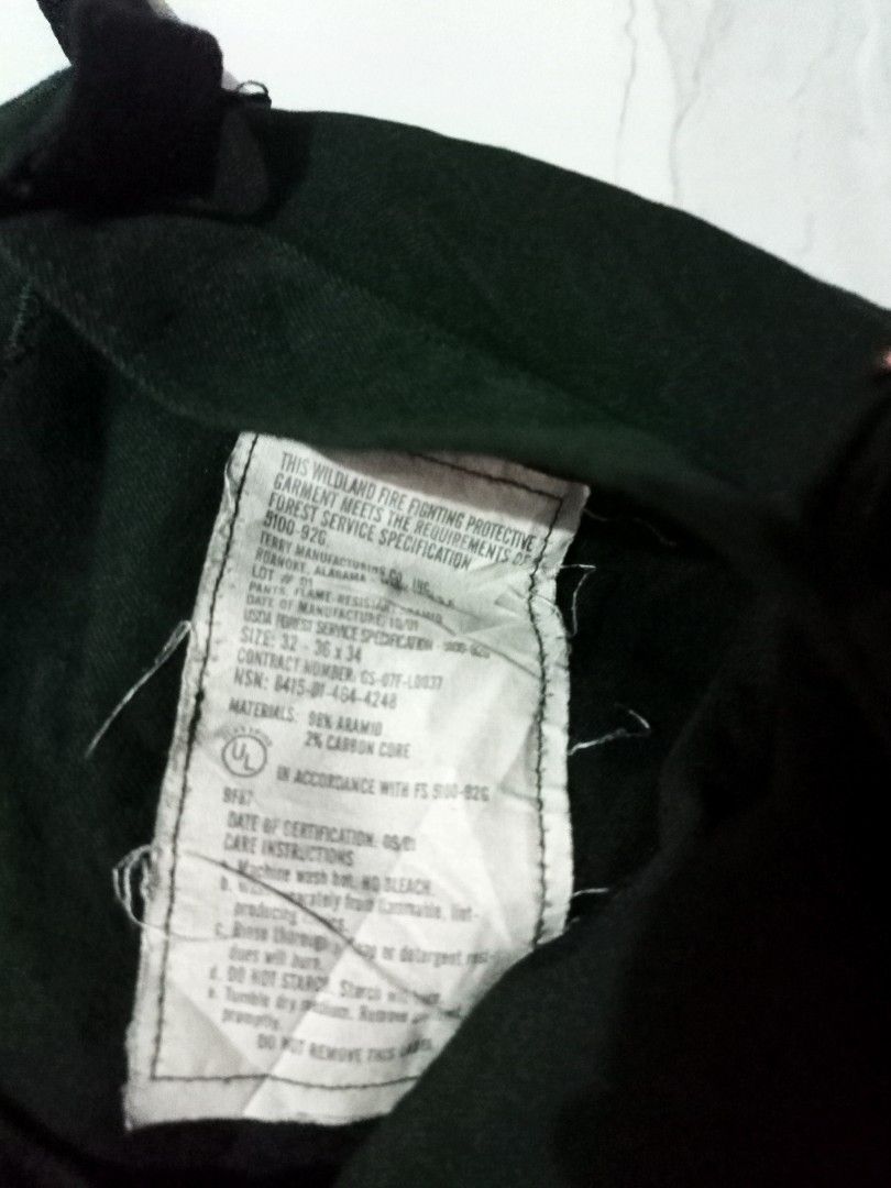 Wildland Fire Fighting Protective Garment Cargo Pants size 36 (Category: Jeans) located in Taguig. Submitted by mvdsh0p2022 (Listing ID 1461325418, Image 3). Description: - Dark green cargo pants - Brand: Tenney Manufacturing Co. Inc. - Size: 36x34 - Material: 80% Aramid, 20% Carbon Core - Meets wildland fire fighting protective garment requirements Dark green Cargo military cargo pants Size 36 Length 37 Excellent condition Color rate 9.8/10 650 