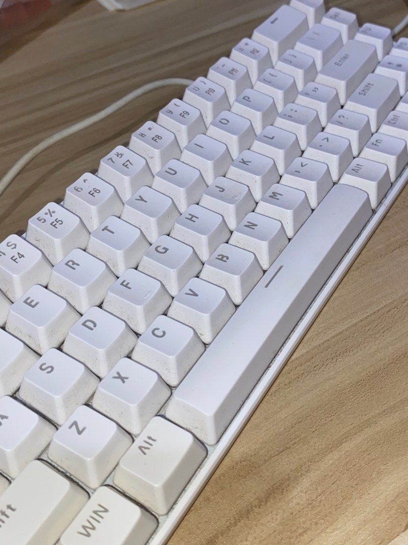 Wired Keyboard - White (Category: Computer Keyboard) located in Quezon City. Submitted by looselei (Listing ID 1461516222, Image 2). Description: *KEYCAPS ARE NOT REPLACEABLE!* with blue back light — have various light modes! USB wire type - can be used on PC or laptop with some issues like: - needs cleaning - few keys don’t have backlight anymore .
