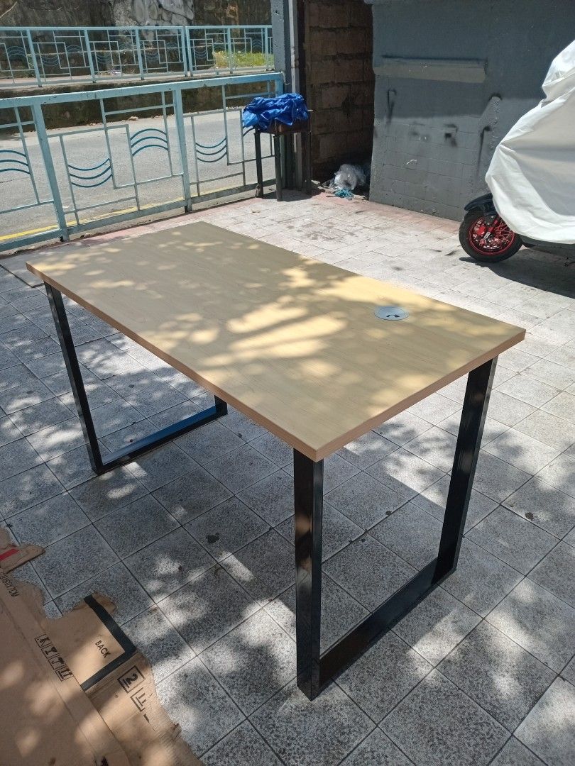 Wooden Table with Black Metal Frame (Category: Tables & Sets) located in Marikina City. Submitted by benjieremo75339 (Listing ID 1461493136, Image 3). Description: - Stylish wooden tabletop with a sleek black metal frame. - Built-in hole for convenient cable management. - Versatile use: ideal as a study desk or a compact dining table. - Solid and sturdy construction for lasting durability. - Looking for a new home – ready for its next owner!.