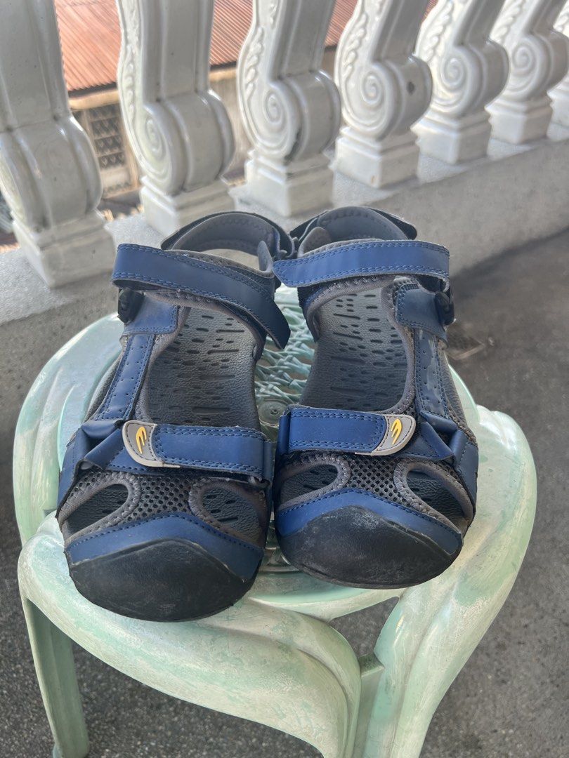 World Balance Blue Sandals for Men (Category: Slippers & Slides) located in Quezon City. Submitted by trisha_1998 (Listing ID 1461325157, Image 1). Description: World Balance - Color: Blue - Features: Adjustable velcro straps, comfortable footbed - Ideal for: Outdoor activities, casual wear - Condition: Good, with minor scuffs on the toe area.