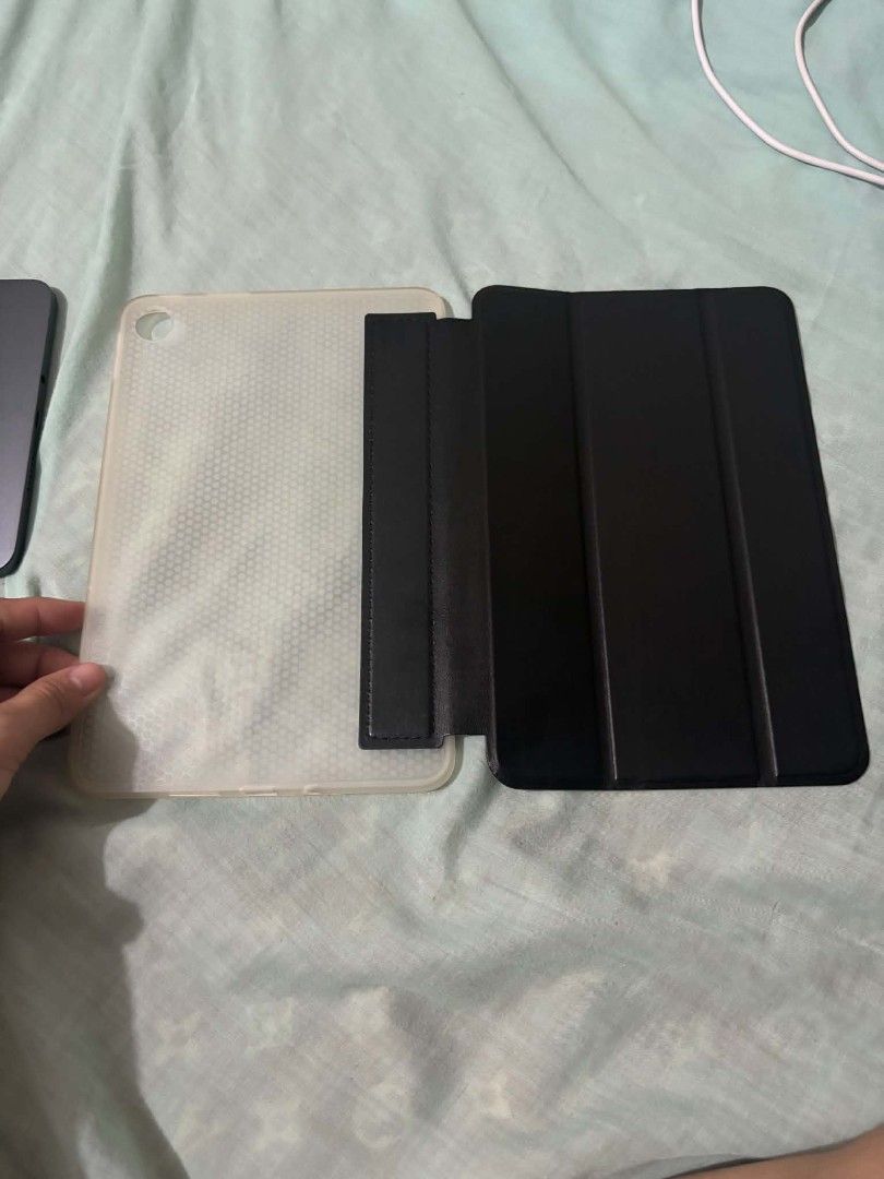 Xiaomi Redmi Pad 9.7 Charger and Case (Category: Android) located in Quezon City. Submitted by aezie (Listing ID 1461461250, Image 2). Description: - Charger for Xiaomi Redmi Pad 9?7 - Includes USB-C cable - Transparent silicone case - Ready for a new owner -Price negotiable..