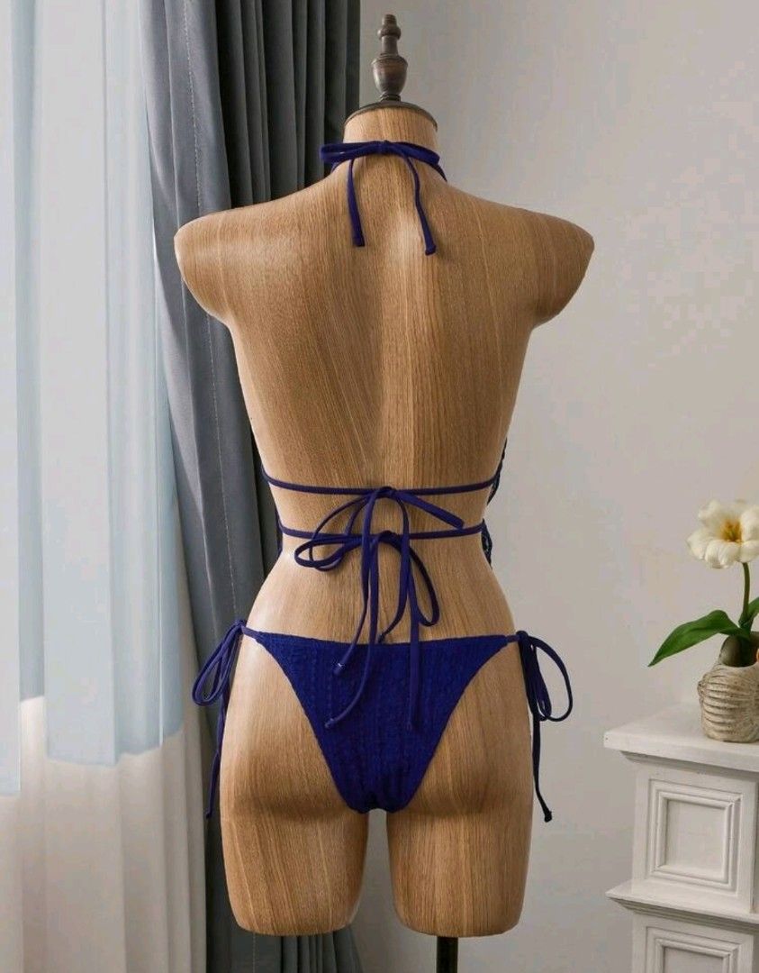 XS Blue Halter Neck Bikini Set (Category: Bikinis & Swimsuits) located in Makati City. Submitted by _gemelli (Listing ID 1461500829, Image 2). Description: - XS Navy Blue Halter Neck Tankini Top With Tie Back And Plain Bikini Bottom Swimwear Set - Halter neck top with tie-back closure - Used once - Ruffled peplum detail on top with decorative buttons - Comfortable and stylish design.