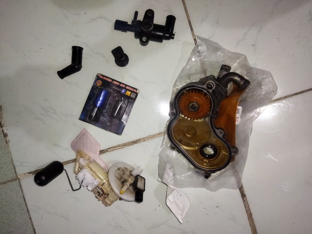 YAMAHA MXI PARTS OUT BUNDLE OR TINGI (Category: Other Motorcycles Parts and Accessories) located in Manila. Submitted by bossdad_og (Listing ID 1461426249, Image 2). Description: 🔥 Yamaha Mio MXi 125 Parts Bundle / Tingi (Stock & Upgrades) 🔥 ​Mga piyesang kasama: 1. ​Water Pump Assembly (Used, stock, maayos ang gears) 2. ​Fuel Pump Assembly (Used, stock) 3. ​Thermostat (Stock replacement part) 4. ​Manual ISC / Idle Speed Controller (Blue) (Bran
