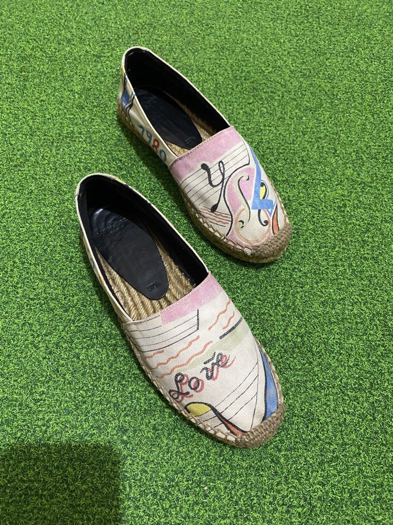 YSL Multicolor Printed Canvas Espadrilles (Category: Sneakers & Footwear) located in Manila. Submitted by victory_1816 (Listing ID 1461561882, Image 3). Description: A chic and distinctive pair of Saint Laurent espadrilles featuring a playful multicolor graphic print on canvas, classic slip-on silhouette, and natural braided jute espadrille sole. The colorful print gives this pair a unique, artistic character while remaining easy to style for cas