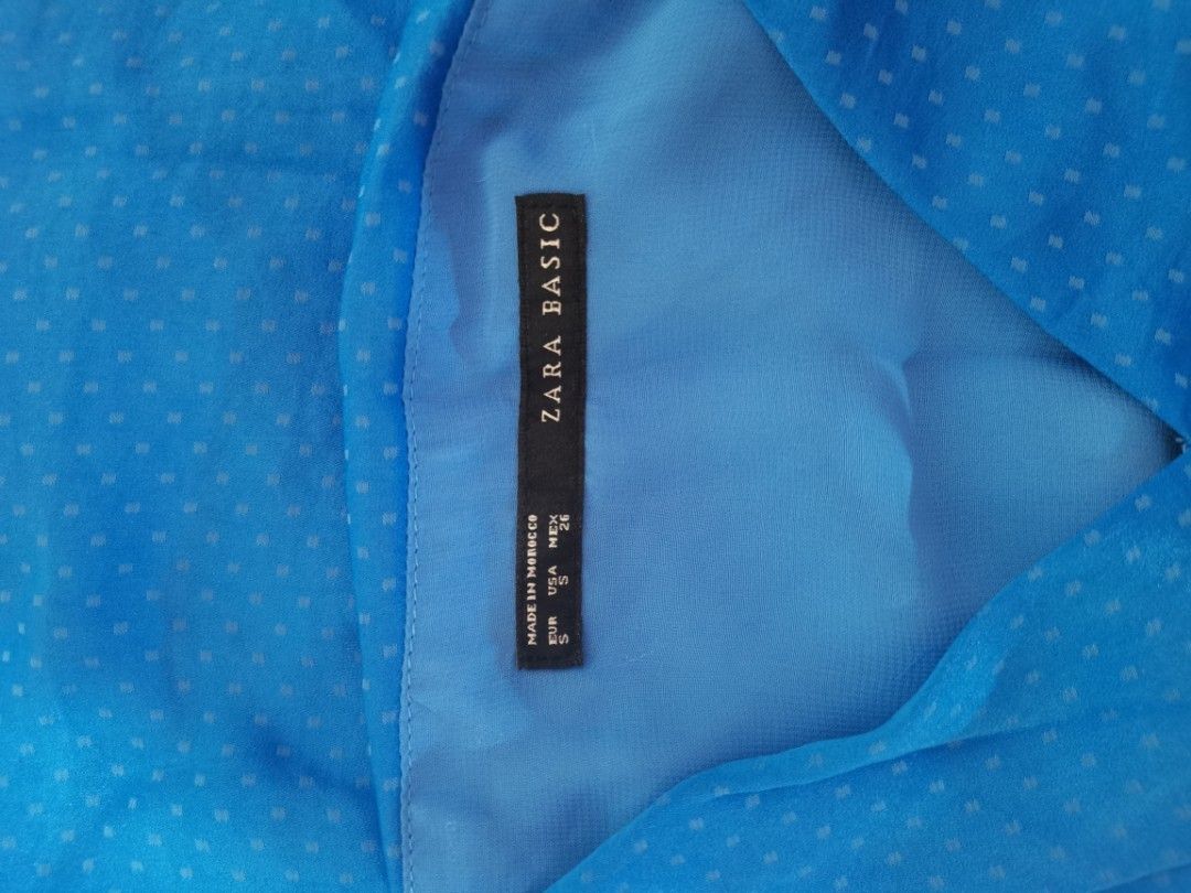 Zara Basic Blue Polka Dot Dress (Category: Dresses) located in Dipolog. Submitted by true.brclo_thing (Listing ID 1461442452, Image 2). Description: - Zara Basic blue dress - Features a subtle all-over polka dot pattern - Made in Morocco - Material: 100% polyester - Ideal for casual wear.