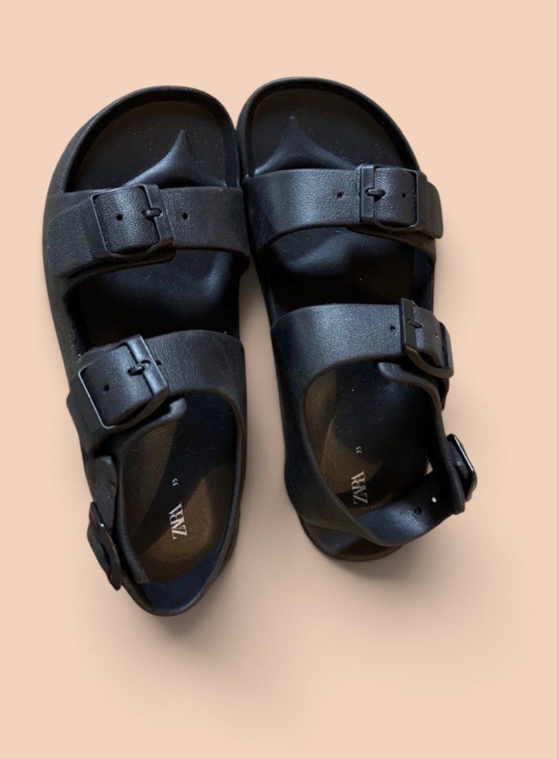 ZARA Black Double Strap Buckle Slides Sandals Size 35 (Category: Flats & Sandals) located in Quezon City. Submitted by letsdeclutter101 (Listing ID 1461552276, Image 2). Description: - Black ZARA slides - Size 35 - Two adjustable buckle straps - Honeycomb pattern sole for enhanced grip - Ideal for casual wear.