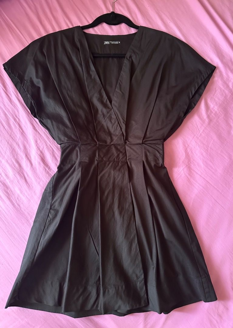 Zara Black V-neck Dress (Category: Dresses) located in Mandaluyong City. Submitted by unworntobarelyworn (Listing ID 1461337651, Image 2). Description: Condition: 9/10 - Elegant black V-neck dress (worn only once) - Flattering cinched waist with elastic back for comfort - Beautiful pleated skirt detail - Short, fluttery sleeves for a stylish touch - Perfect for various occasions, easy to wear - Can fit XS to S.