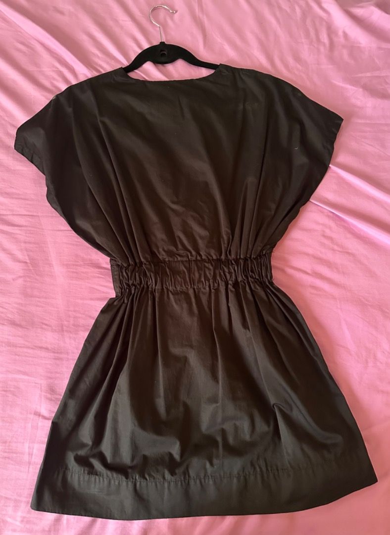 Zara Black V-neck Dress (Category: Dresses) located in Mandaluyong City. Submitted by unworntobarelyworn (Listing ID 1461337651, Image 3). Description: Condition: 9/10 - Elegant black V-neck dress (worn only once) - Flattering cinched waist with elastic back for comfort - Beautiful pleated skirt detail - Short, fluttery sleeves for a stylish touch - Perfect for various occasions, easy to wear - Can fit XS to S.