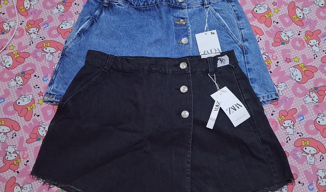 ZARA Denim Skirt - Black & Blue (Category: Skirts) located in Manila. Submitted by katkween23 (Listing ID 1461448603, Image 3). Description: - Two ZARA denim skirts: 1 black, 1 blue wash. - Features button-front closure. - Trendy frayed hem detail. - Ideal for casual outfits. - Don't miss out!.