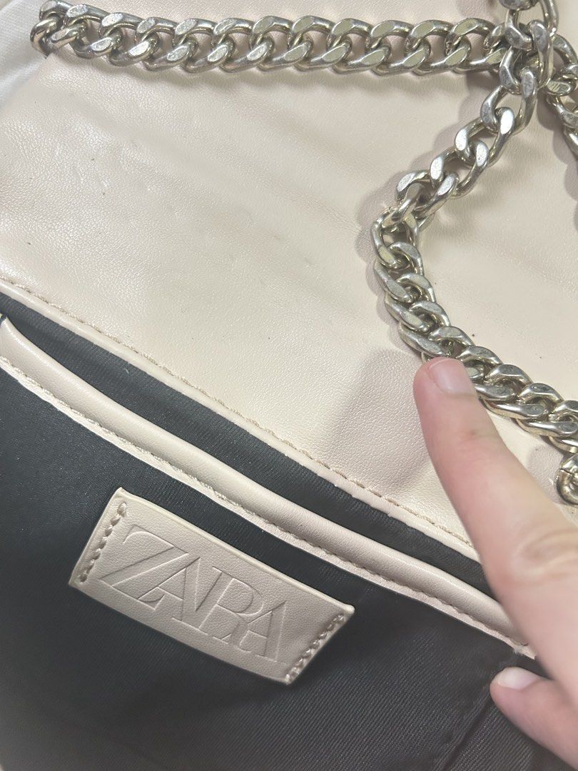 Zara Quilted Chain Shoulder Bag (Category: Shoulder Bags) located in Manila. Submitted by shivroy48 (Listing ID 1461337114, Image 2). Description: - Light pink Zara shoulder bag - Quilted pattern - Gold-tone turn-lock closure - Leather and metal chain strap - Comes with Zara dust bag - Versatile for casual or dressed-up looks.