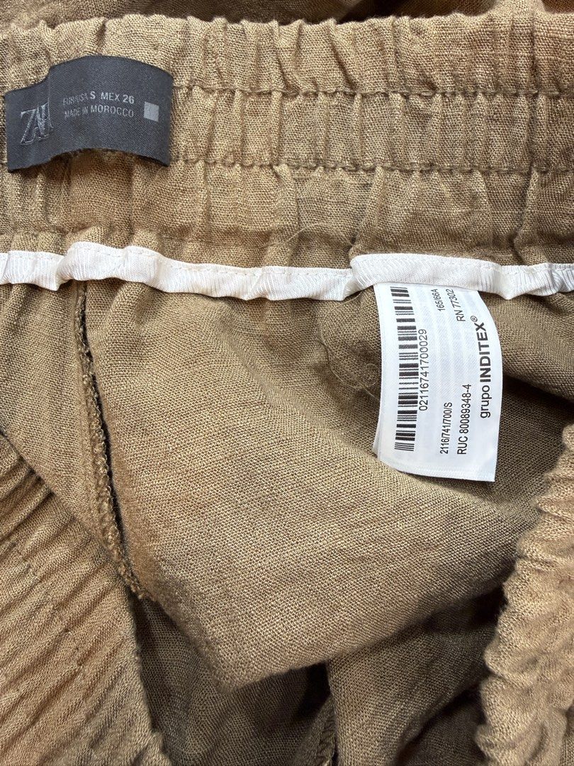 ZARA Rustic Wide-Leg Trousers - Brown (Category: Other Bottoms) located in Iloilo. Submitted by dabyladaby2 (Listing ID 1461502887, Image 2). Description: - Brand: ZARA - Color: Brown - Material: Linen-blend - Fit: Wide-leg - Features: Elasticated waistband - Style: Casual, stylish, super comfy - Origin: Made in Morocco - Size: S / MEX 26 -once used.