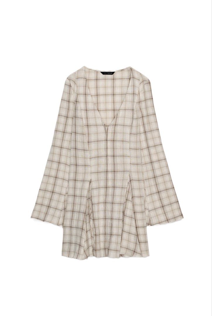 zara short plaid mini dress (Category: Dresses) located in Angeles City. Submitted by thriftchic_ (Listing ID 1461455542, Image 3). Description: ♡ no issue! ♡ v neckline ♡ long sleeves with a flared hem ♡ xs-s Note: ♡ item is in excellent condition ♡ color may appear brighter or darker due to lighting ♡ please manage expectation as there may be minimal flaws unnoticed by the seller ♡ MOP: Gcash ♡ Payment first basis ♡ J&T🚚.