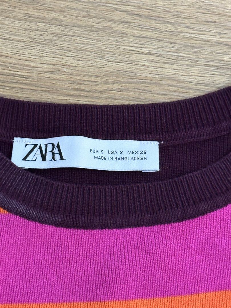 Zara Striped Knit Crop Top Size S (Category: Others Tops) located in Las Pinas. Submitted by gg_1968 (Listing ID 1461329422, Image 2). Description: - Zara knit crop top - Features horizontal stripes in purple, pink, and orange - Sleeveless design - Versatile: great for layering or wearing on its own - Made in Bangladesh.