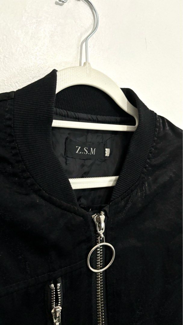 Z.S.M Metallic-Sheen Zip-Up Bomber Jacket (Category: Coats, Jackets and Outerwear) located in Caloocan City. Submitted by buymethisandthat (Listing ID 1461464149, Image 2). Description: ✨ Z.S.M Metallic-Sheen Zip-Up Bomber Jacket - ₱149 📌 CONDITION • Condition: 9/10 • Flaws: None visible 📏 SIZE • Tag Size: No size tag • Recommended: Fits Small to Medium .