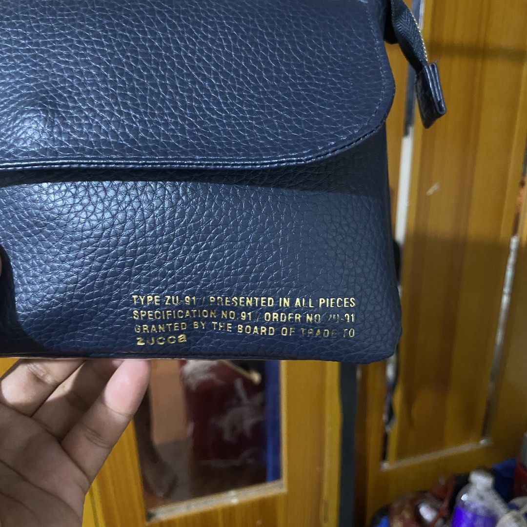 ZUUCa Type ZU-91 Leather Utility Sling Bag (Category: Sling Bags) located in Manila. Submitted by 4114thrifts.ph (Listing ID 1461486128, Image 2). Description: Item Name: ZUCCa Type ZU-91 Leather Utility Sling Bag (Details) • Condition: Very Good Condition • Color Rate: 9.6/10 • Issue/s: Super Minimal Sign of Usage Mine: 1,450 Free Shipping 📥 Dasmariñas City, Cavite, 4114📍.